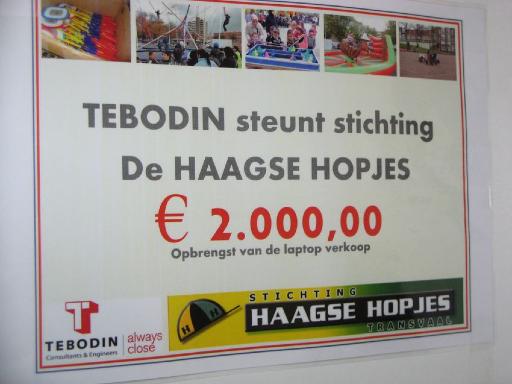Stichting Haagse Hopjes ontvangt een check van 2000 euro van Tebodin